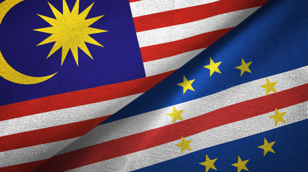Malaysia and cape cabo verde two folded flags together