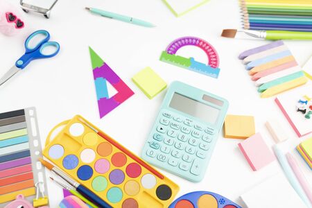School supplies set of colorful school accessories isolated on the white table